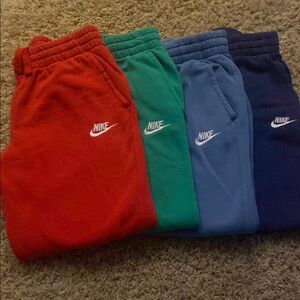 Nike Kids Jogger Pants - Red, Green, Blue, and Black